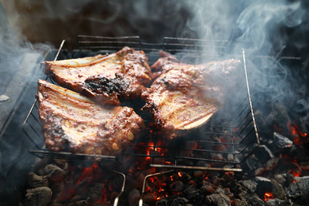 istock Cooking pork ribs on grill 1348196934