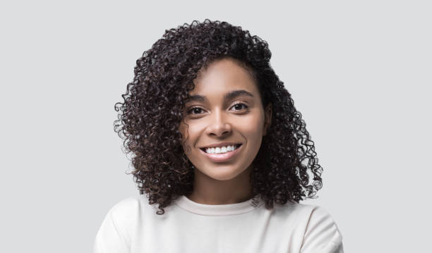 istock Young woman close-up isolated studio portrait 1348197512