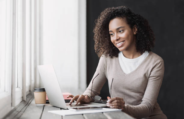 istock Young woman working from home. Student girl studying online 1348197521