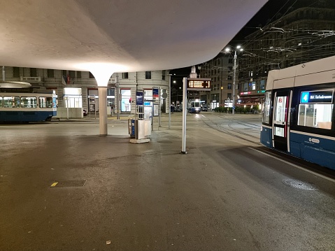 Zürich City with Trams stopping at Bellevue Square. The nightshot was captured during autumn season.