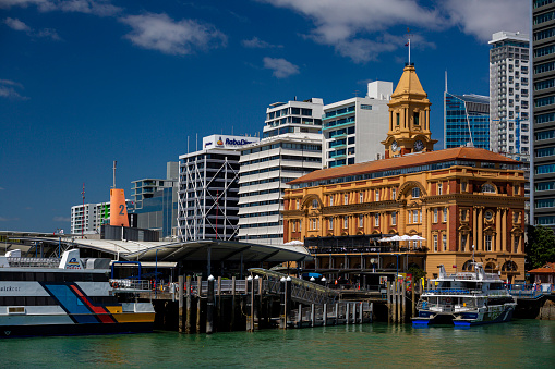 Auckland, New Zealand - 10 March 2016: Exterior view of the famous Ferry Building in Auckland Central on a sunny day.