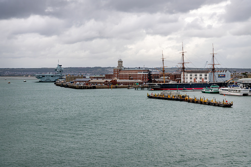 Old and New Ships Docked in the portsmouth Harbour, England