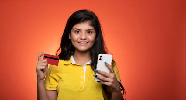 istock Young woman using mobile phone stock photo 1348201272