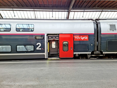 TGV Lyria railway lines connecting France and Switzerland. The image shows aTGV Lyria Euroduplex train (double-deck) Train at Zurich Main Railway Station.