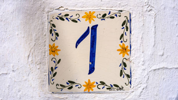 istock ceramic house number table. number: 1. on a white background 1348205747