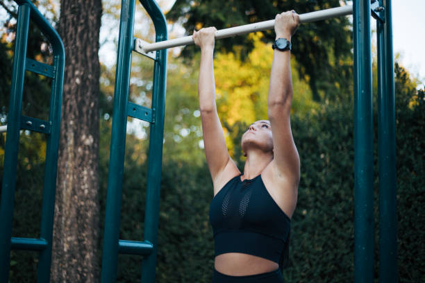 istock young woman exercising in nature 1348206572