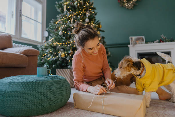 istock Wrapping Christmas presents together 1348207763