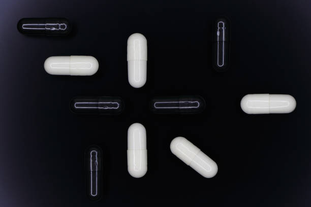 istock Abstract Black And White Gel Pill Capsule Layout 1348209364