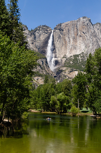 River and Yosemite waterfall in the background