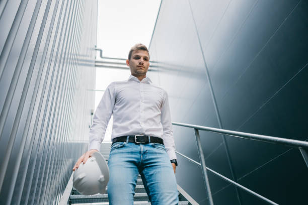 istock Engineer walking downstairs at factory 1348217256