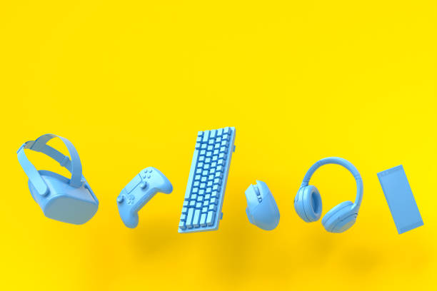 Flying gamer gears like mouse, keyboard, joystick, headset, VR on yellow