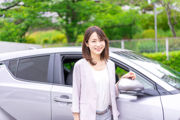 istock A young woman who bought her own car 1348219863