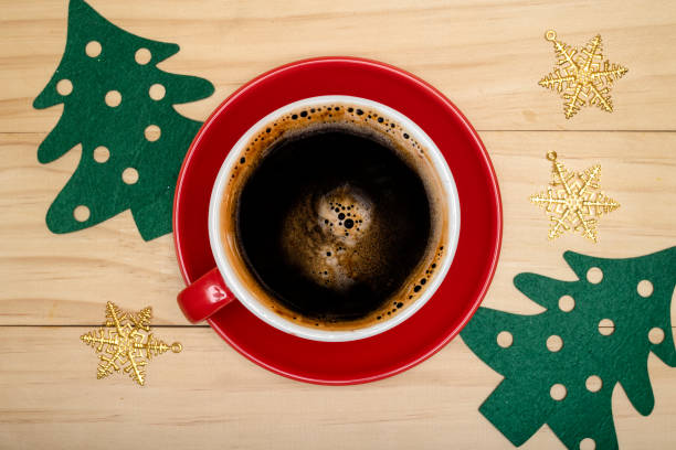 istock A cup of black coffee with Christmas decorations. 1348221739