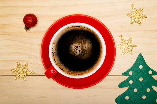 istock A cup of black coffee with Christmas decorations. 1348221754