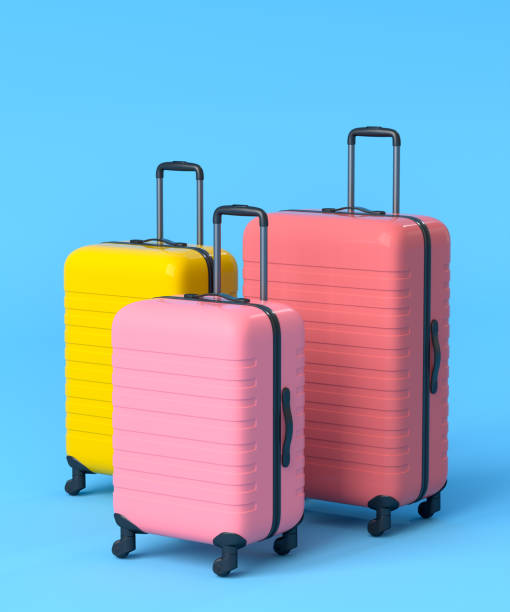 istock Colorful suitcase on blue background. 3D render of summer vacation concept 1348223687