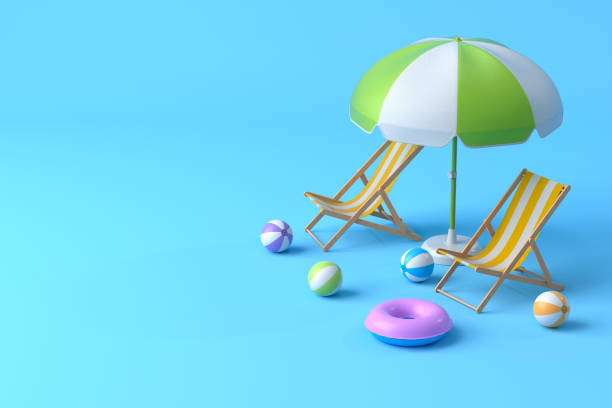 istock Beach chair with umbrella and beach ball on blue background. 1348224990