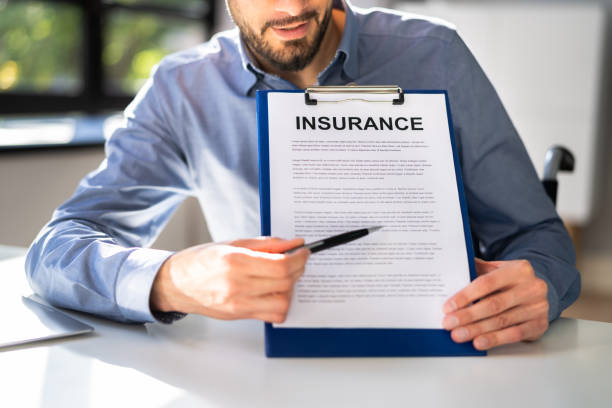 istock Agent Showing Company Insurance Policy 1348229180
