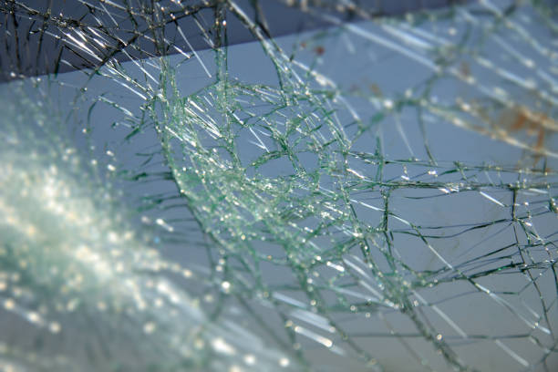 istock Car with the broken windshield during road accident 1348230555