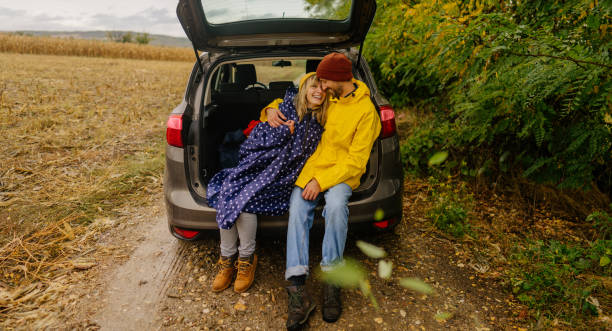 istock Smiling couple on a road trip 1348230788