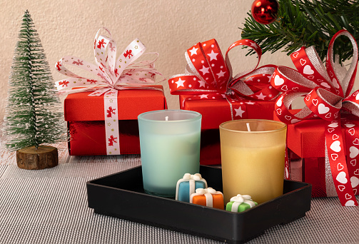 Christmas decorations with gift boxes and scented candles