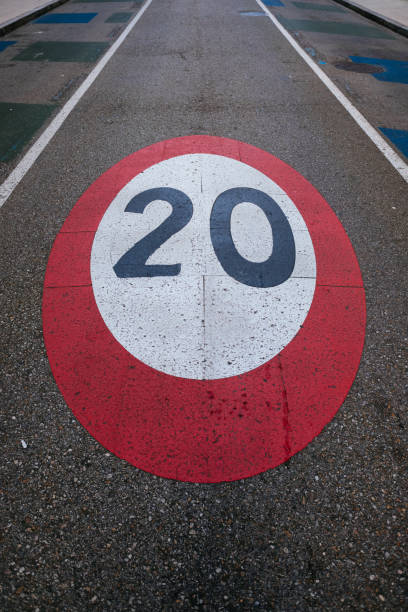 istock Speed limit sign painted on the road 1348234982