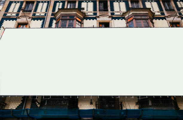 istock Large horizontal billboard on a vintage building wall, mock up 1348234983