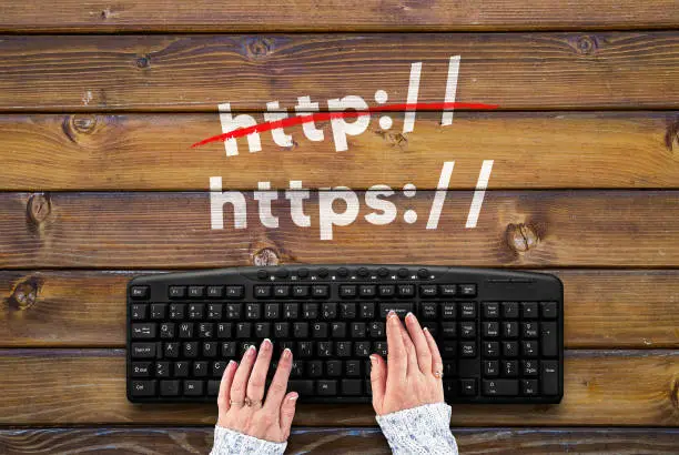 https, Crossed Out http on wooden table and pc keyboard