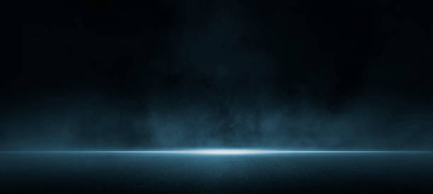 Dark street, asphalt abstract dark blue background, empty dark scene, neon light Dark street, asphalt abstract dark blue background, empty dark scene, neon light, spotlights The concrete floor and studio room with smoke float up the interior texture for display products wall background. searchlight photos stock pictures, royalty-free photos & images