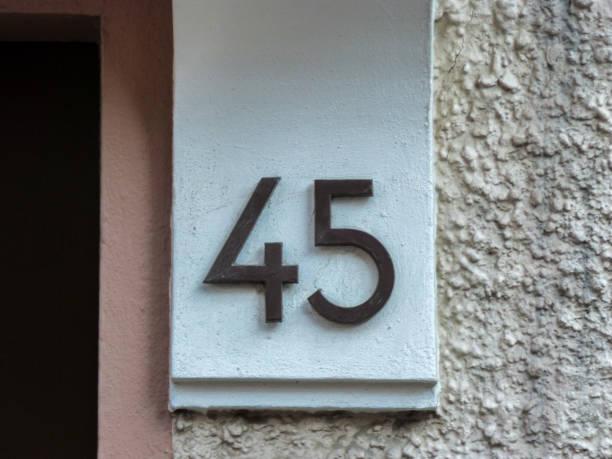 istock Metal number on a home 1348239149