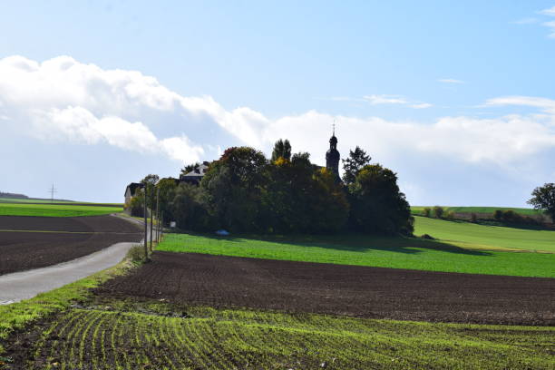 istock pilgrim church Fraukirch between autumn trees 1348246090