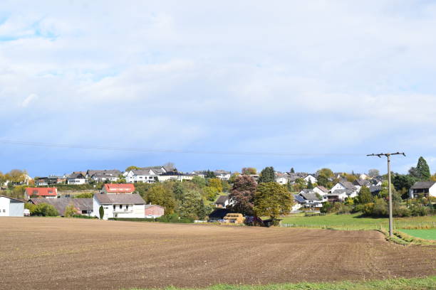 istock view to village Ochtendung at plowed fields 1348246099