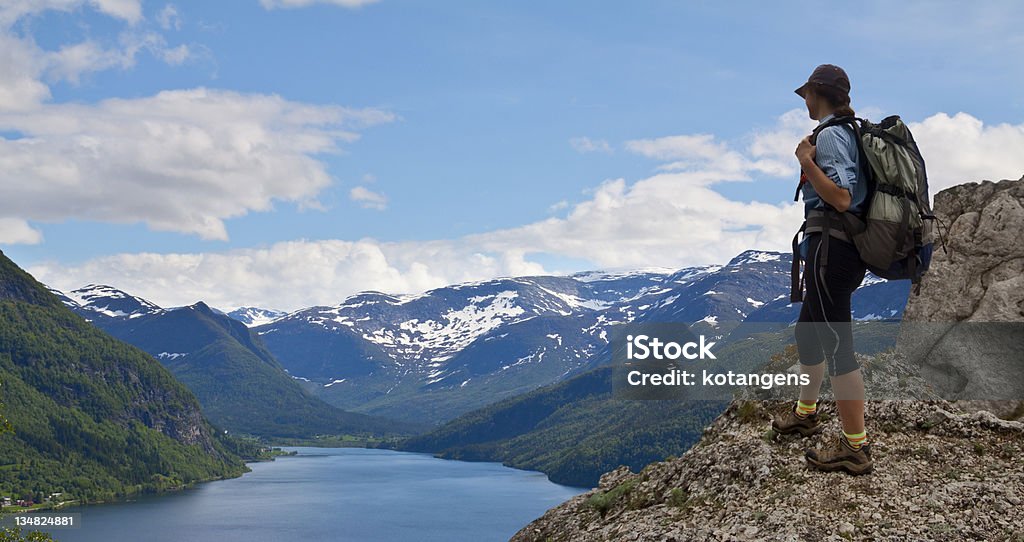 woman trekking in mountains Please see my active lifestyle: Activity Stock Photo