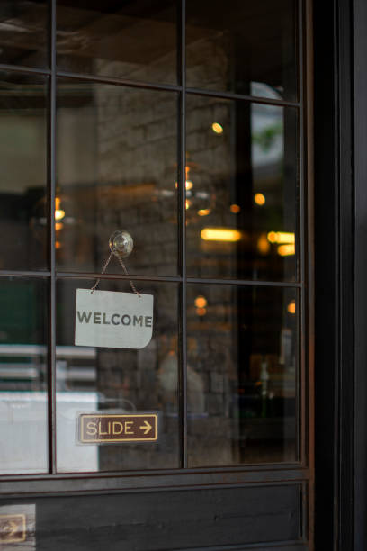 istock Welcome sign outside a restaurant, store, office or other 1348249247