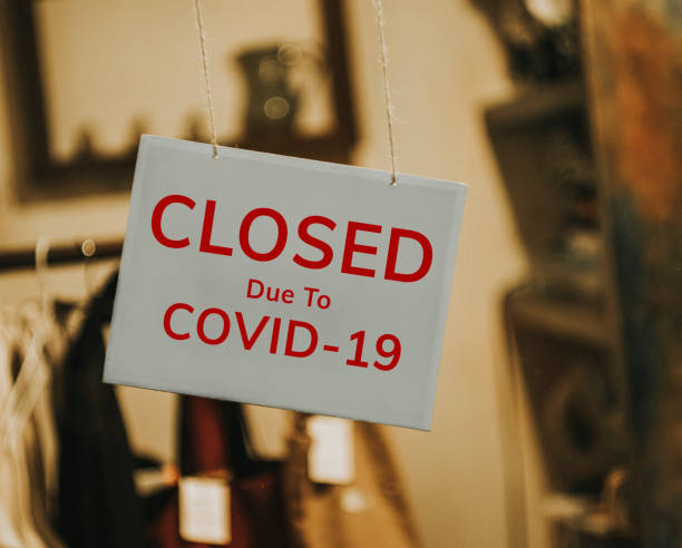 istock closed sign hanging outside a restaurant, store, office or other 1348249279