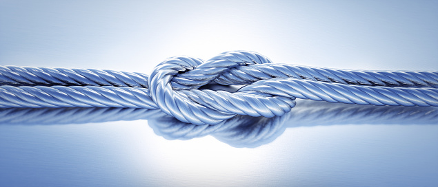 Reef knot, Square knot of silver rope isolated on light silver background