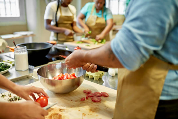istock Corporate Colleagues Working Together in Cooking Class 1348253986