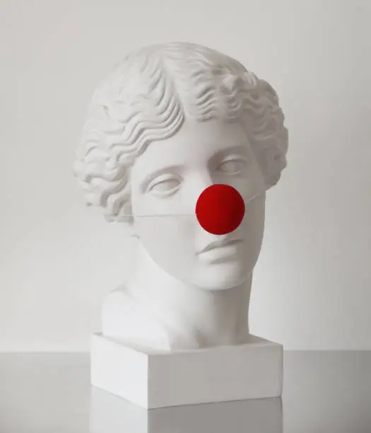 Plaster head model (mass produced replica of Head of an Amazon) with clown’s nose