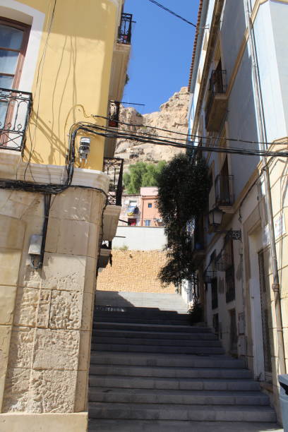 istock Narrow street with stairs 1348256825