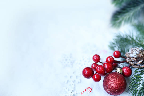 istock Fir branch with Christmas decorations on white background. Holiday concept. 1348260435