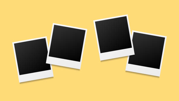 istock Set of four blank photo frames template with shadow effect isolated on yellow background. Photo frames mockup design. Collage concept. EPS 10 vector illustration. 1348261284