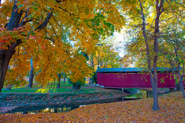 Bridge-Red Covered Bridge-built in 1875-Howard County Indiana Bridge-Red Covered Bridge-built in 1875-Howard County Indiana indiana covered bridge stock pictures, royalty-free photos & images