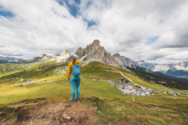 istock Woman hiker exploring Passo Giau in Dolomites 1348262395