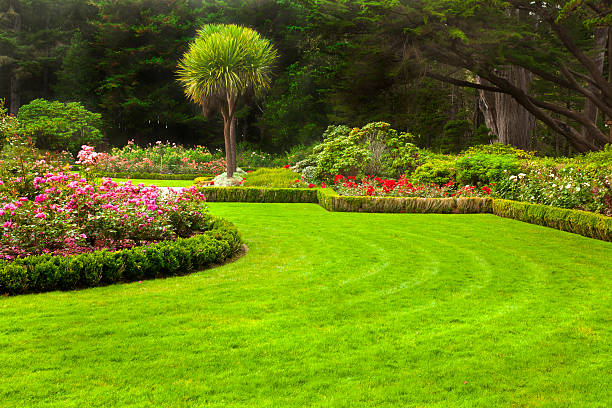 istock Flower garden and grassy green fields 134826279