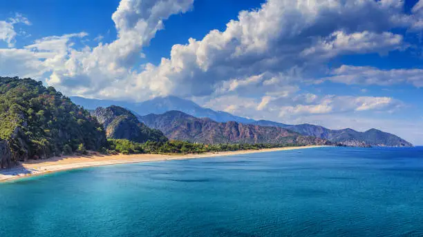 Summer mediterranean coastal landscape - view of the Cirali Olympos Beach, near the Turkish village of Cral, Antalya Province in Turkey