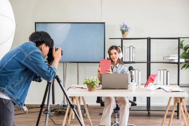 istock Behind the scene. Photograph influencer in studio 1348273268