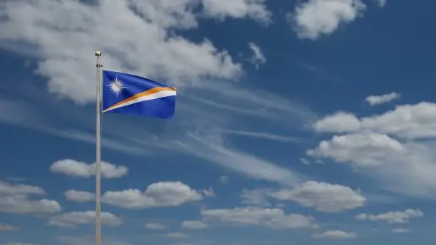 3D, Marshallese flag waving on wind with blue sky and clouds. Marshall banner blowing, soft and smooth silk. Cloth fabric texture ensign background.