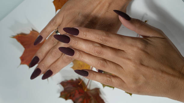 istock burgundy manicure nail art 1348286881