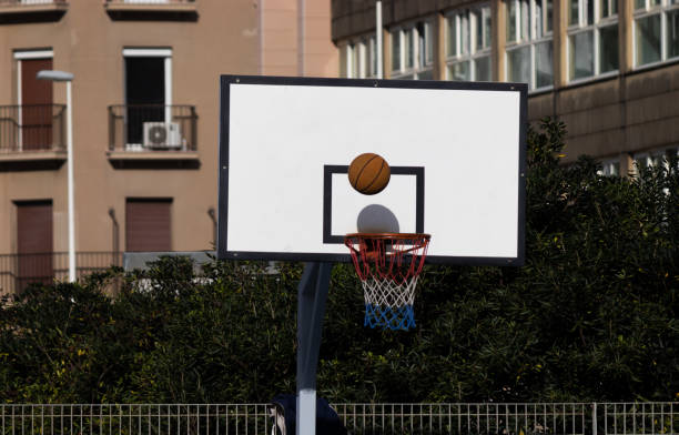 istock basketball hoop on the street 1348290322