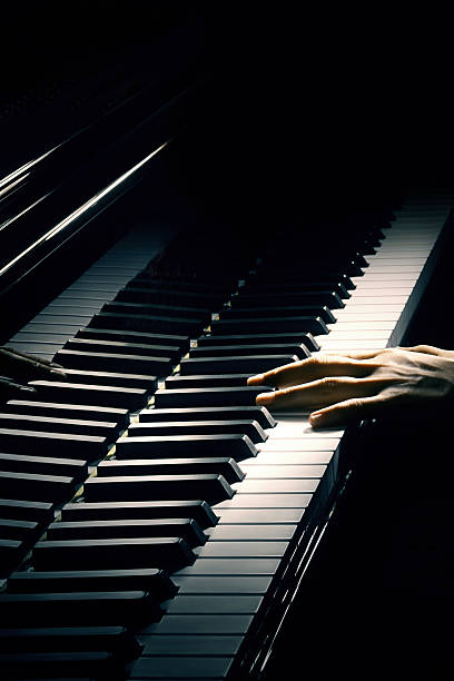 istock Piano music pianist hand playing. 134829283