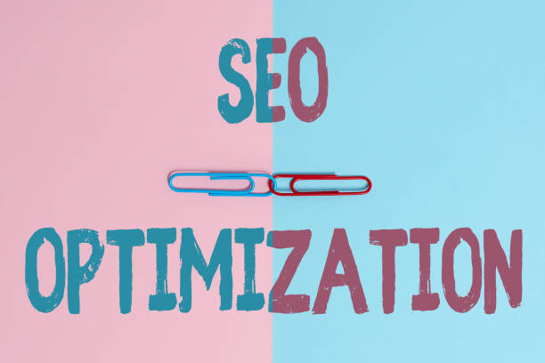 istock Text caption presenting Seo Optimization. Conceptual photo increasing visibility of a website or a web page to users Two Objects Arranged Facing Inward Outward On a Separated Coloured Background 1348293454